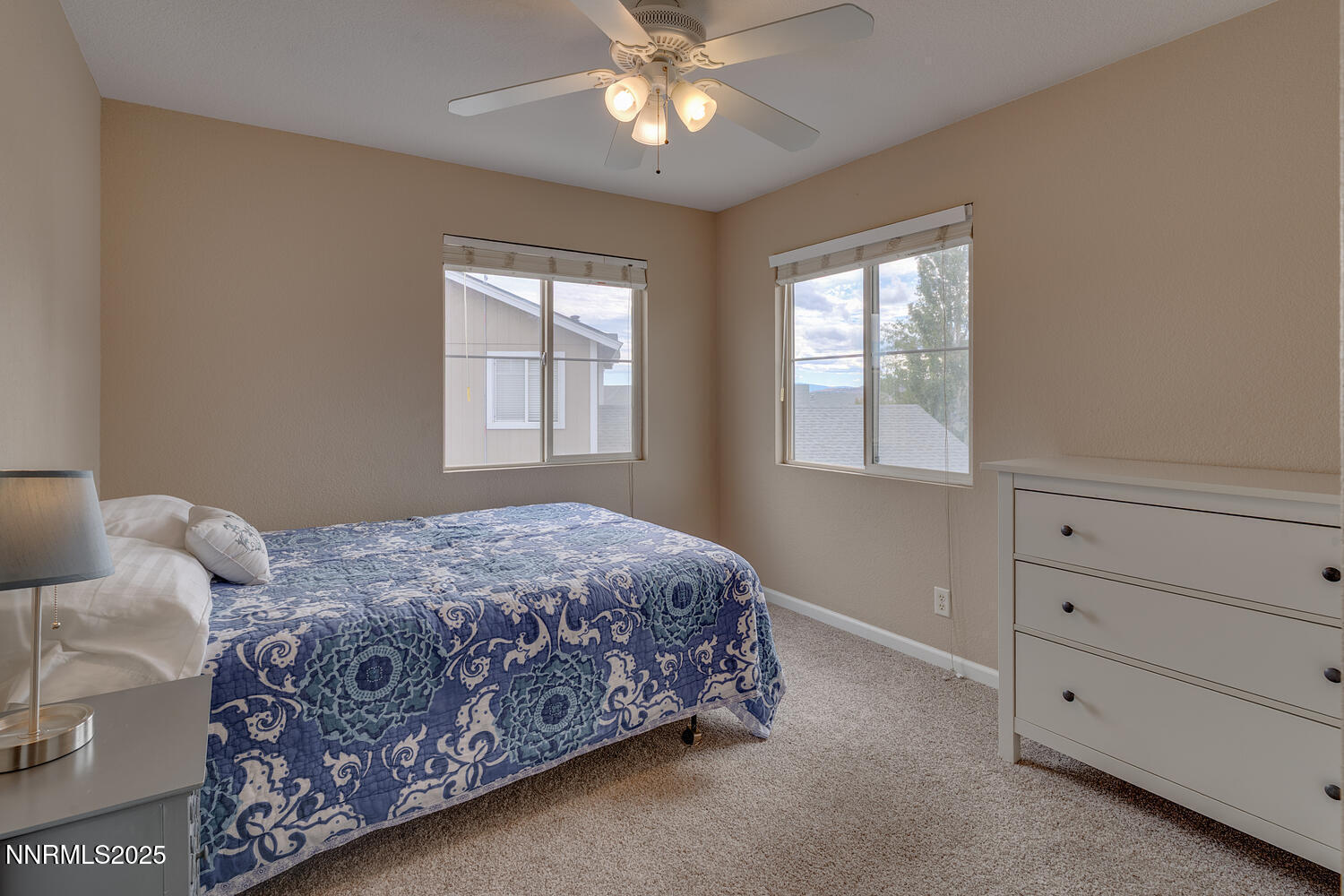1750 Polo Park Drive Reno, NV 89523 - Photo 21 of 25 a bedroom with a bed and window
