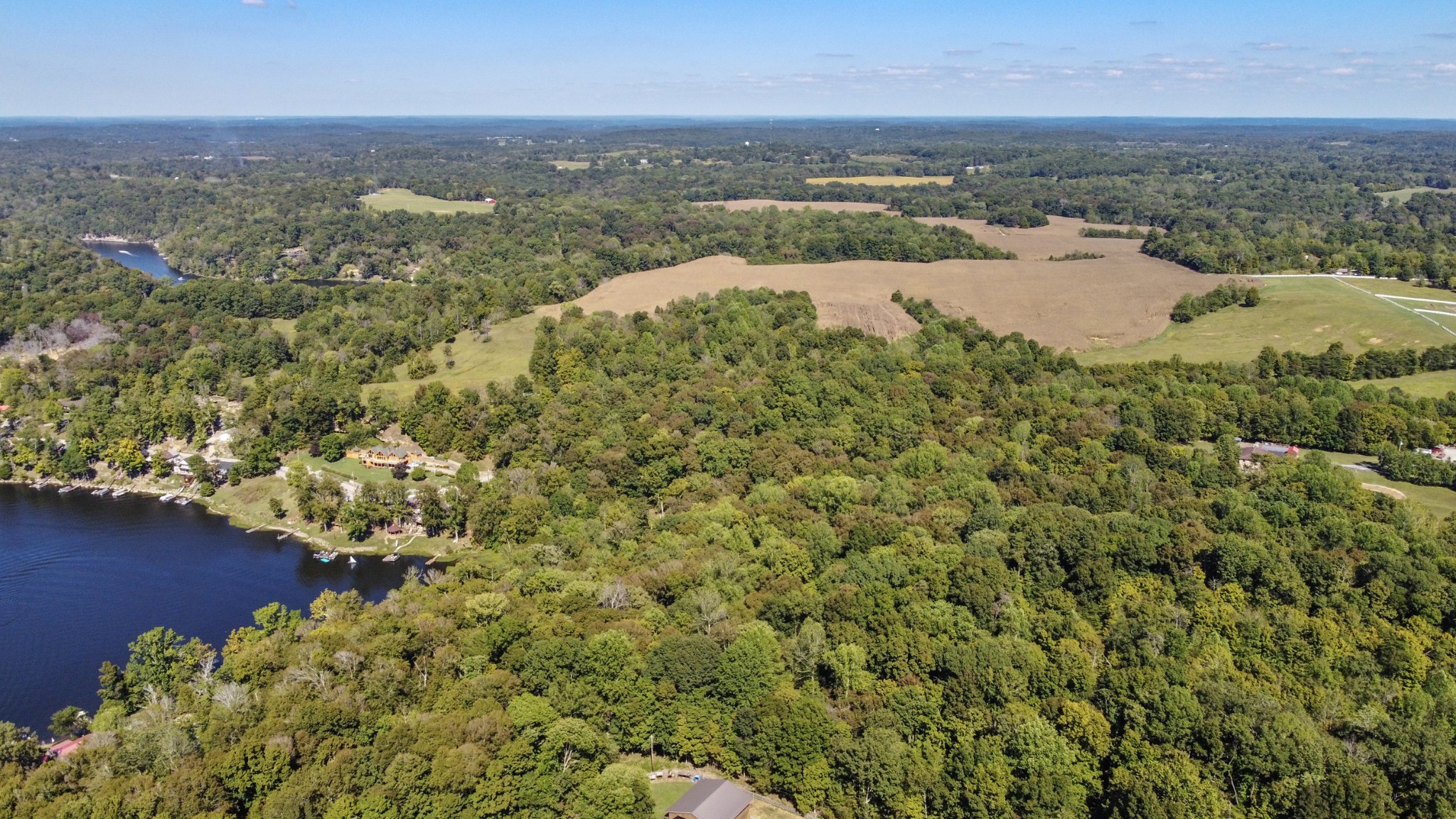 294 Cherokee Boat Dock Road Lewisburg, KY 42256 - Photo 17 of 21 an aerial view of residential houses with outdoor space and trees