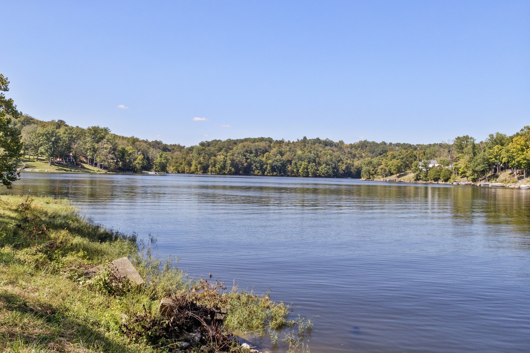294 Cherokee Boat Dock Road Lewisburg, KY 42256 - Photo 2 of 21 a view of a lake with a mountain in the background