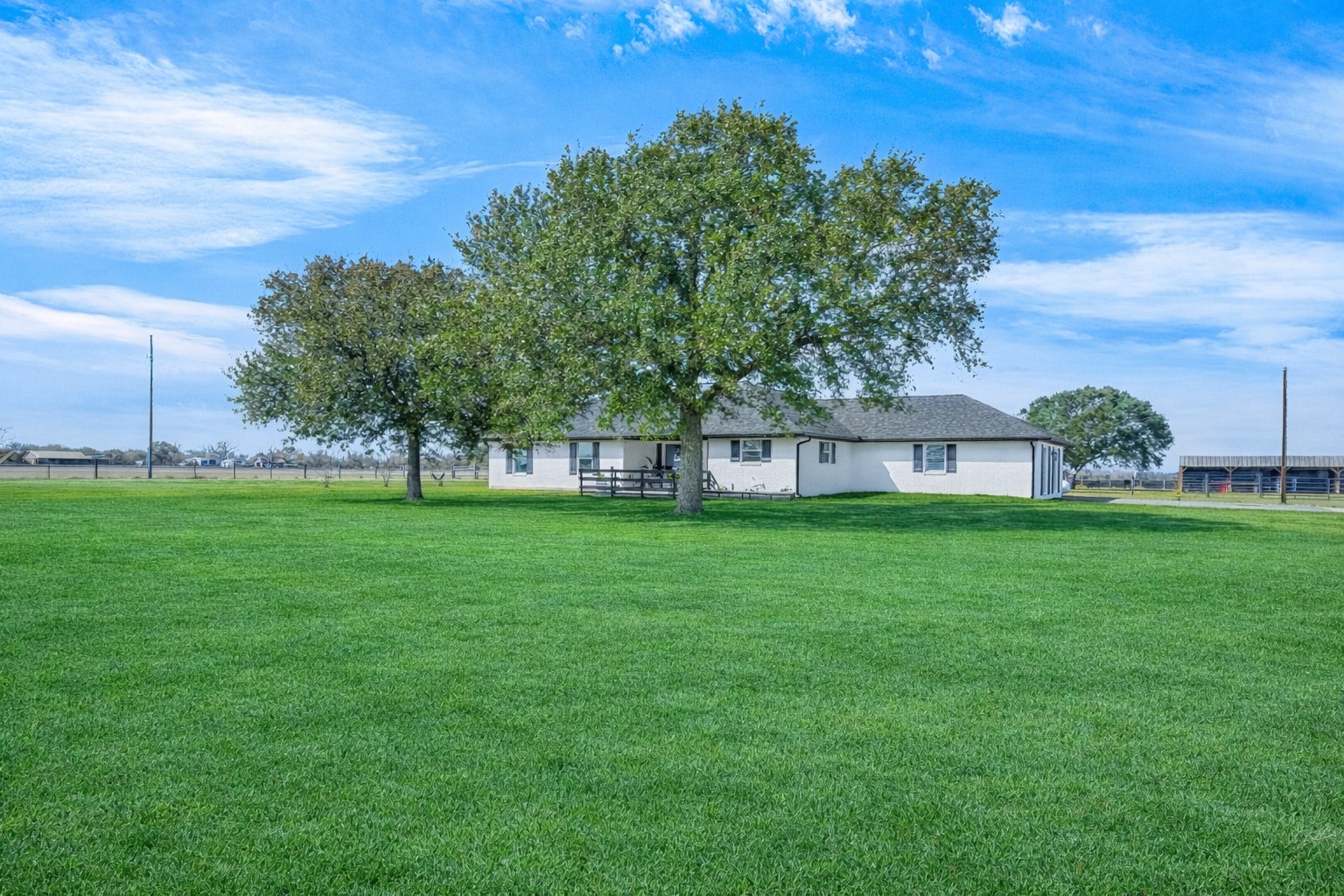 10550 Brinkmeyer Road Needville, TX 77461 - Photo 1 of 40 View of the front of home from the driveway (grass color has been digitally altered)
