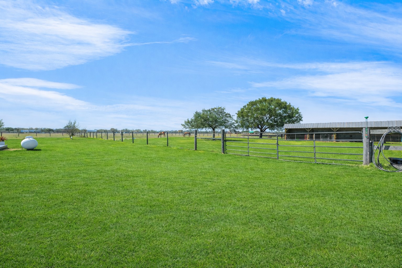 10550 Brinkmeyer Road Needville, TX 77461 - Photo 35 of 40 Fenced horse pasture with loafing shed (grass color has been digitally edited)