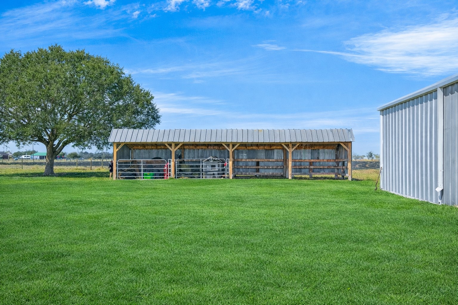 10550 Brinkmeyer Road Needville, TX 77461 - Photo 36 of 40 Fenced and cross fenced behind the shop (grass color has been digitally altered)