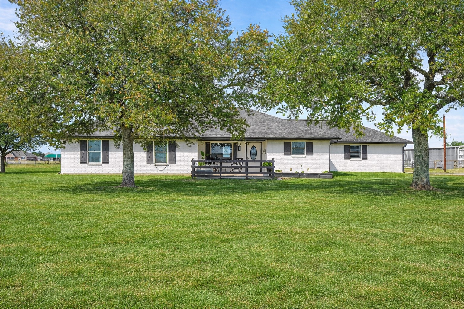 10550 Brinkmeyer Road Needville, TX 77461 - Photo 4 of 40 View of front of the home (grass color has been digitally altered)