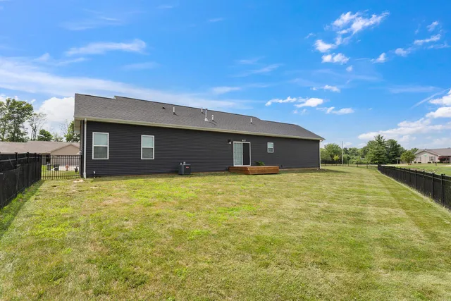 a house view with a swimming pool