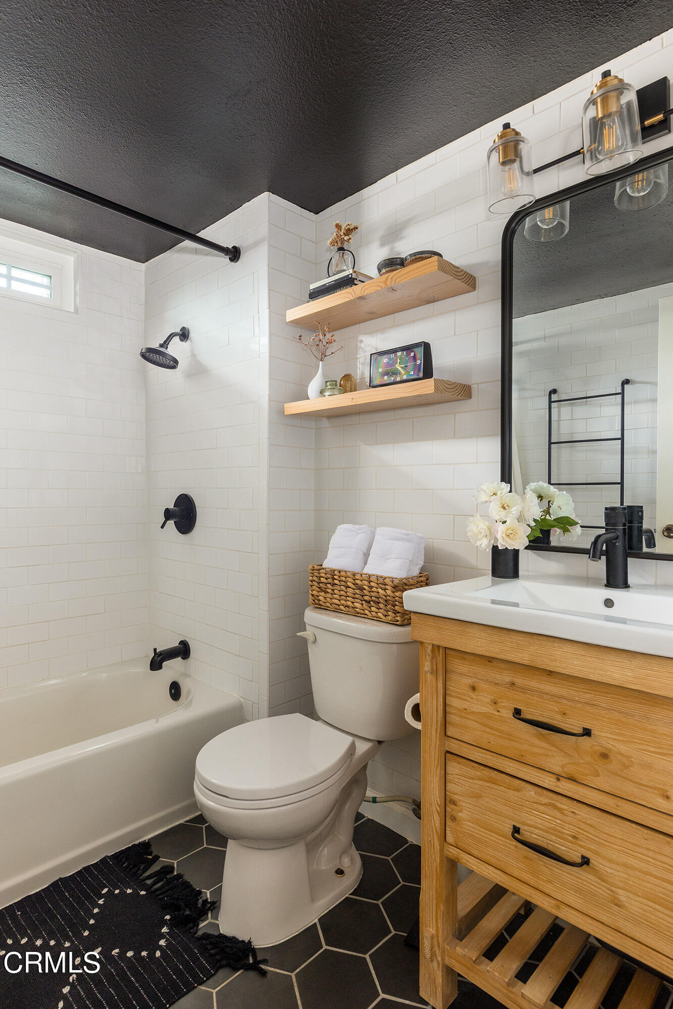 9704 Hillhaven Avenue Tujunga, CA 91042 - Photo 14 of 24 a bathroom with a sink a toilet and shower