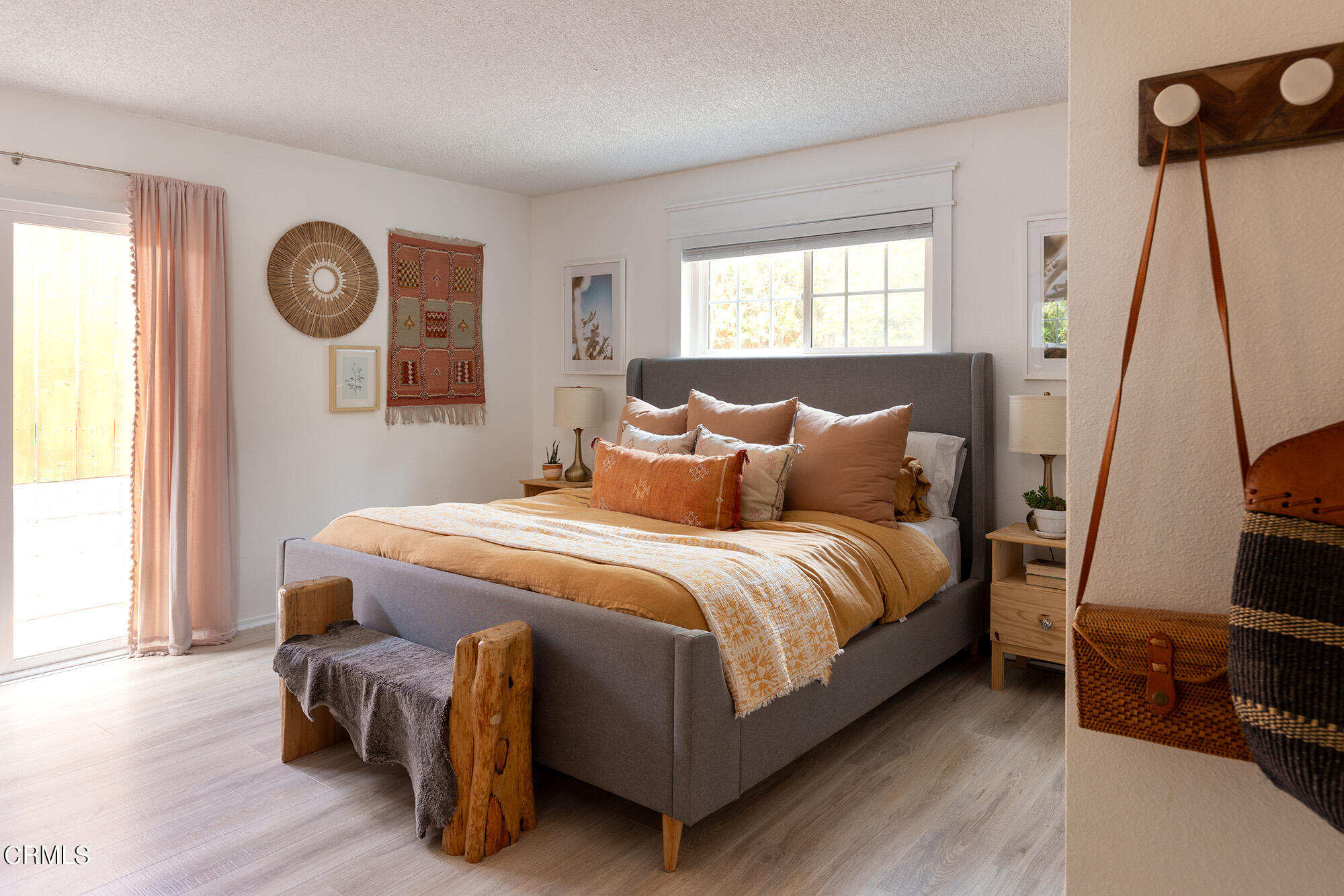 9704 Hillhaven Avenue Tujunga, CA 91042 - Photo 15 of 24 a bedroom with a bed and a window