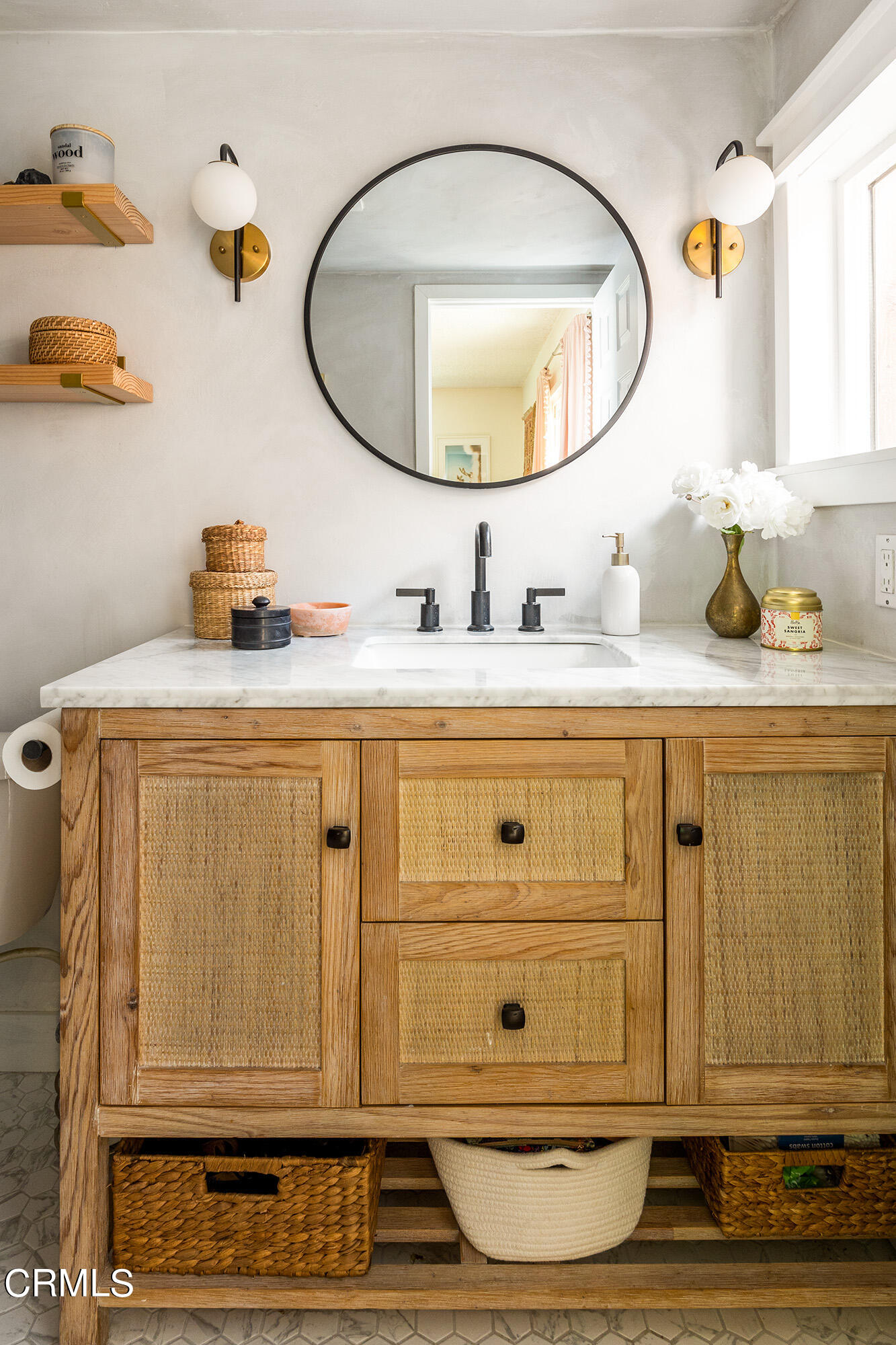 9704 Hillhaven Avenue Tujunga, CA 91042 - Photo 18 of 24 a bathroom with a sink and a mirror
