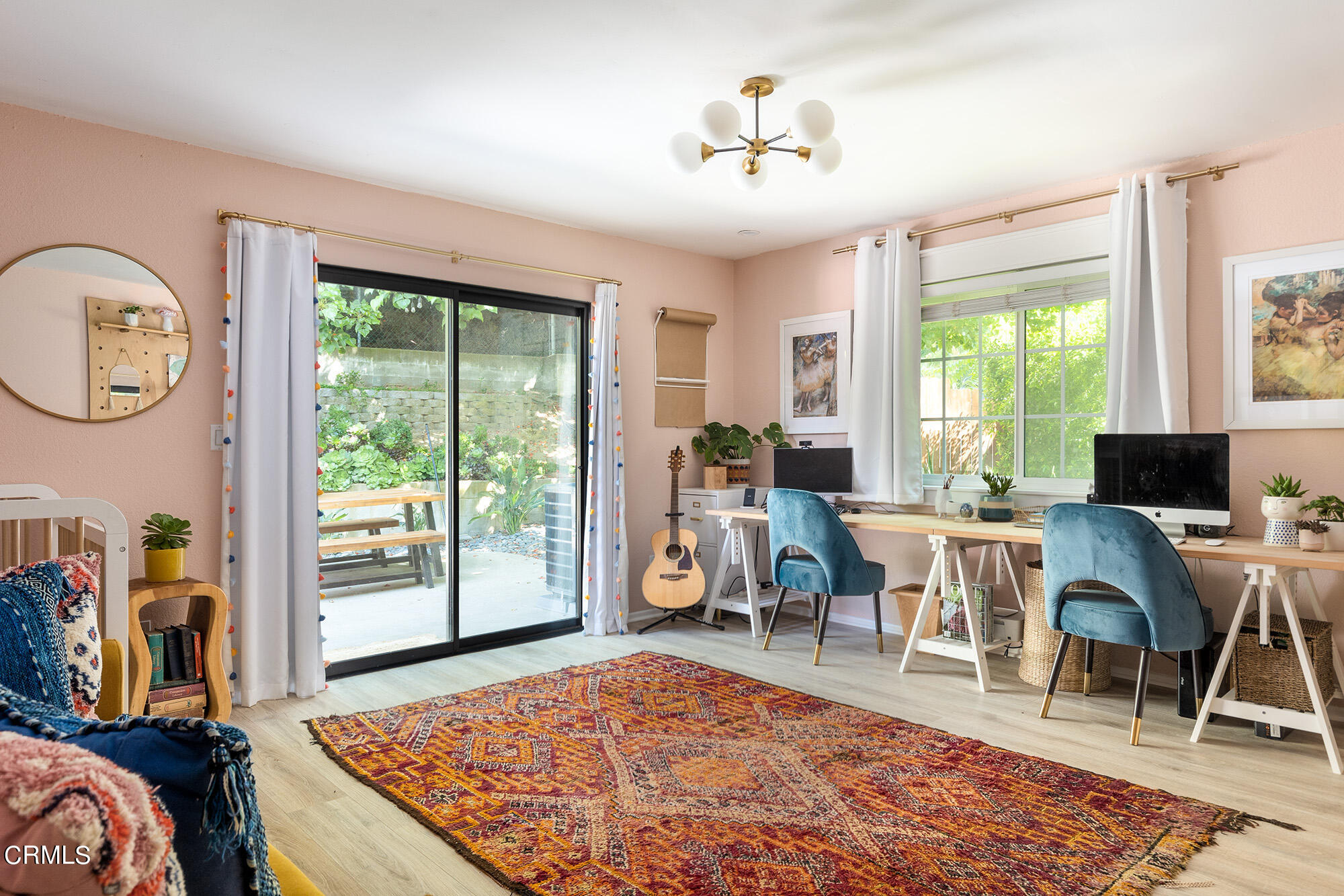 9704 Hillhaven Avenue Tujunga, CA 91042 - Photo 19 of 24 a living room with furniture a flat screen tv and a large window