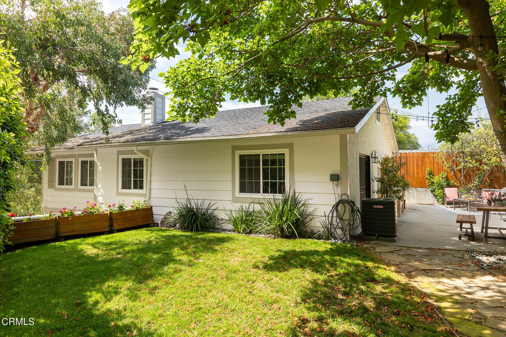 9704 Hillhaven Avenue Tujunga, CA 91042 - Photo 23 of 24 a view of a house with backyard