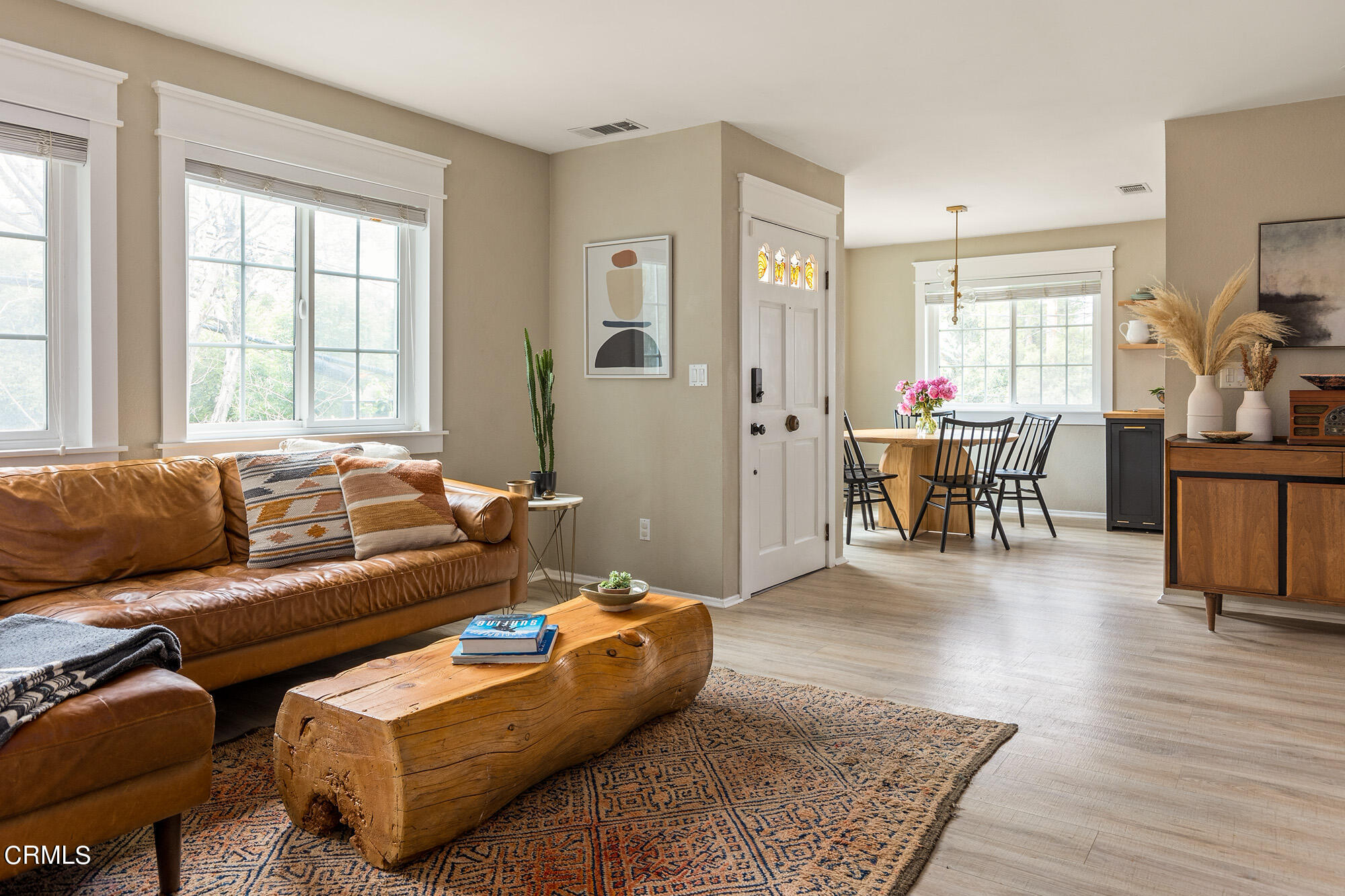 9704 Hillhaven Avenue Tujunga, CA 91042 - Photo 4 of 24 a living room with furniture and wooden floor