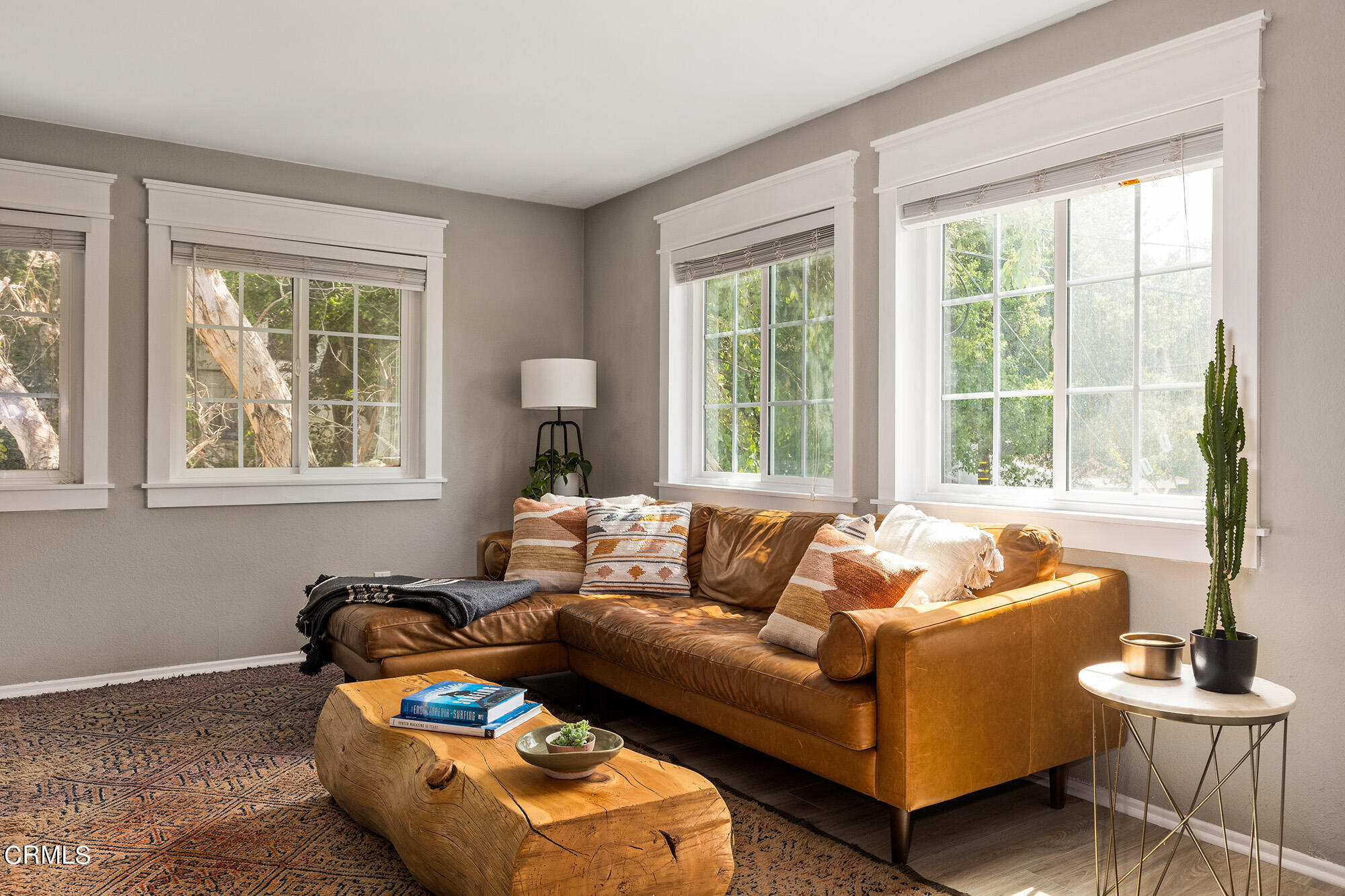 9704 Hillhaven Avenue Tujunga, CA 91042 - Photo 5 of 24 a living room with furniture and a large window