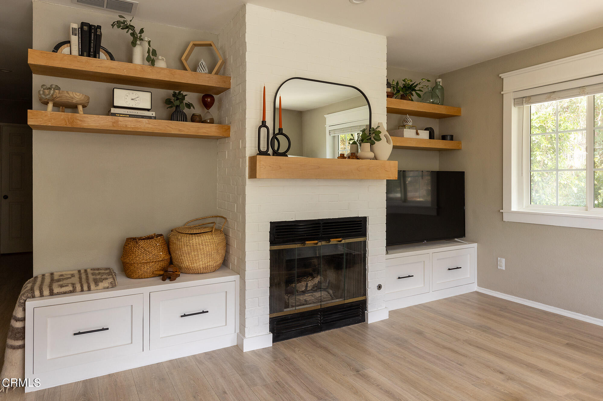 9704 Hillhaven Avenue Tujunga, CA 91042 - Photo 7 of 24 a living room with furniture and a fireplace