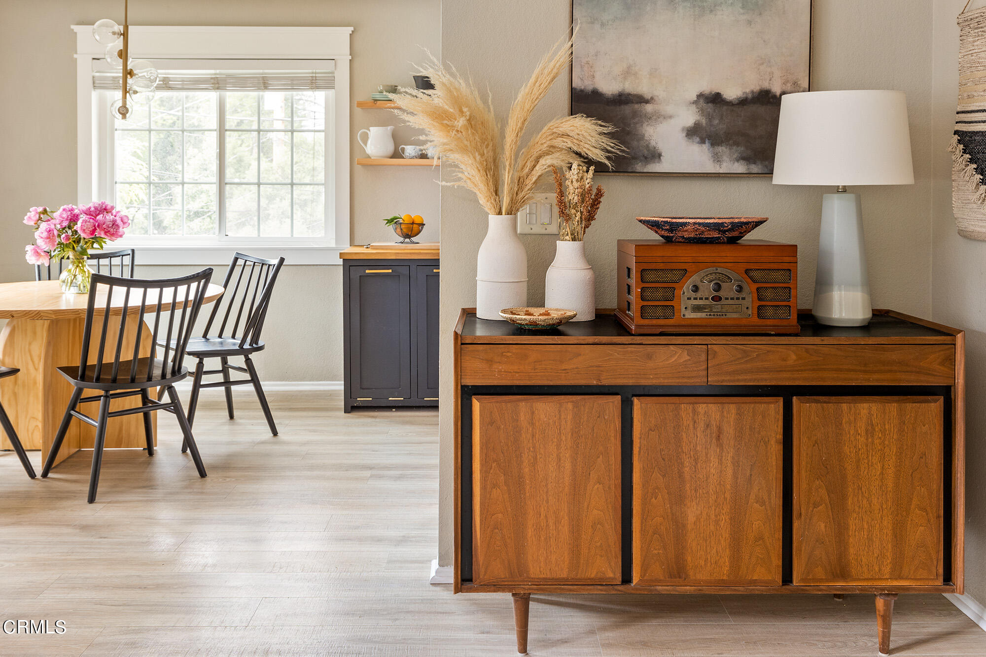 9704 Hillhaven Avenue Tujunga, CA 91042 - Photo 8 of 24 a dining room with furniture and wooden floor