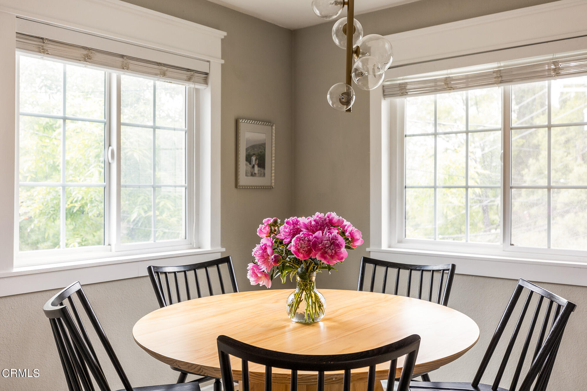 9704 Hillhaven Avenue Tujunga, CA 91042 - Photo 9 of 24 a view of a dining room with furniture window and wooden floor