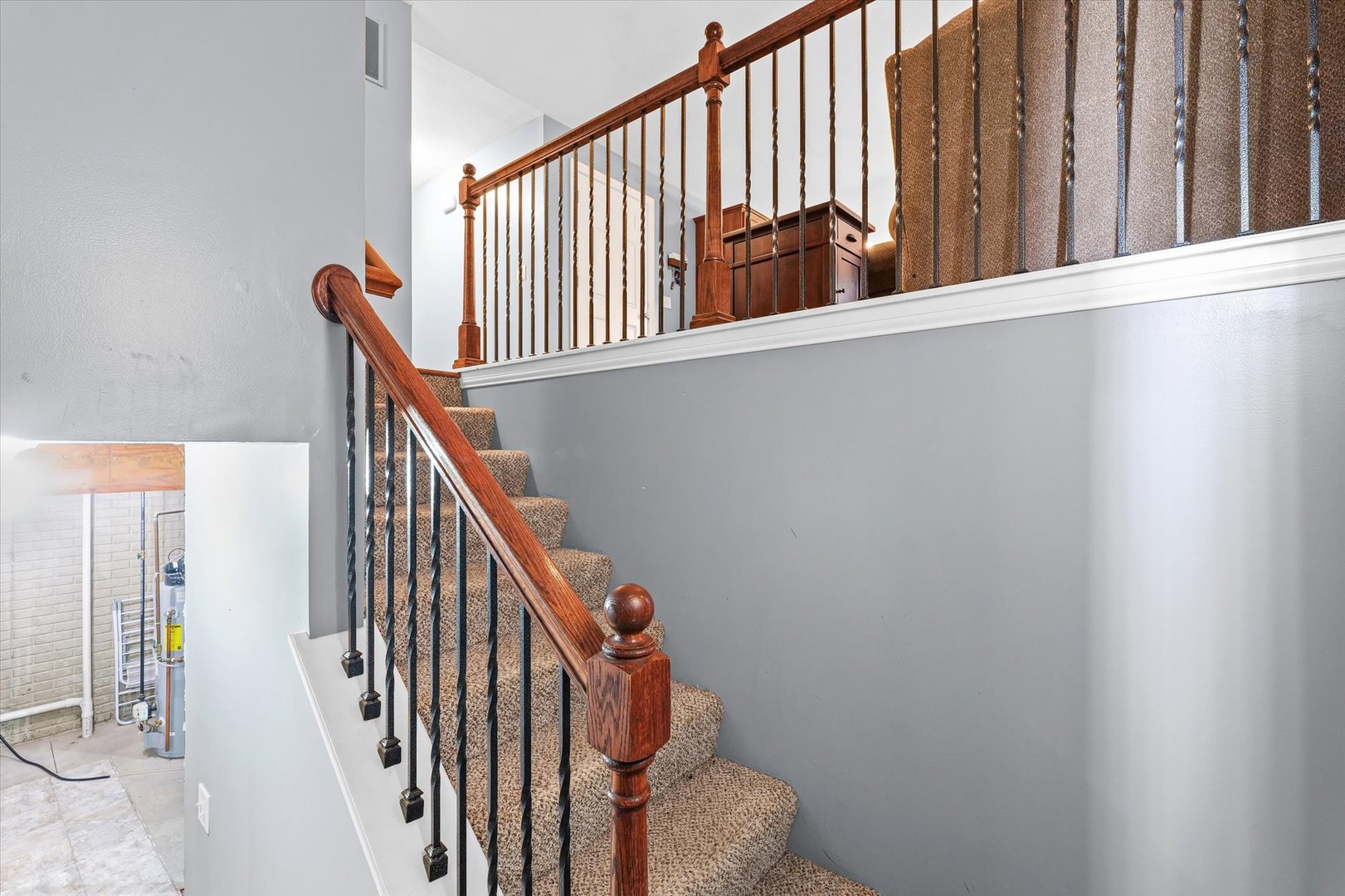 1713 Hunters Ridge Court Mahomet, IL 61853 - Photo 22 of 30 a view of staircase with railing and white walls