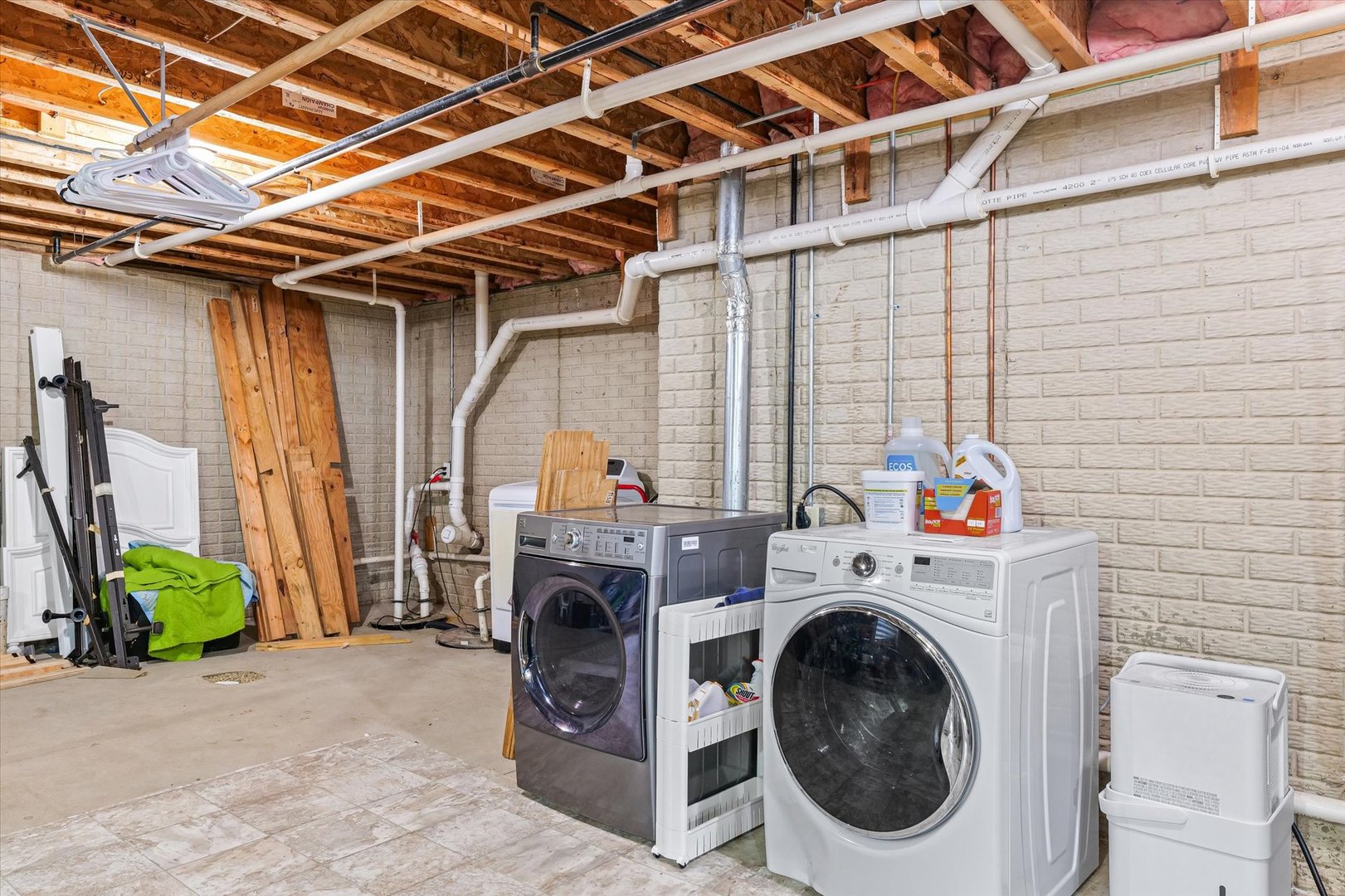 1713 Hunters Ridge Court Mahomet, IL 61853 - Photo 23 of 30 a utility room with dryer and washer