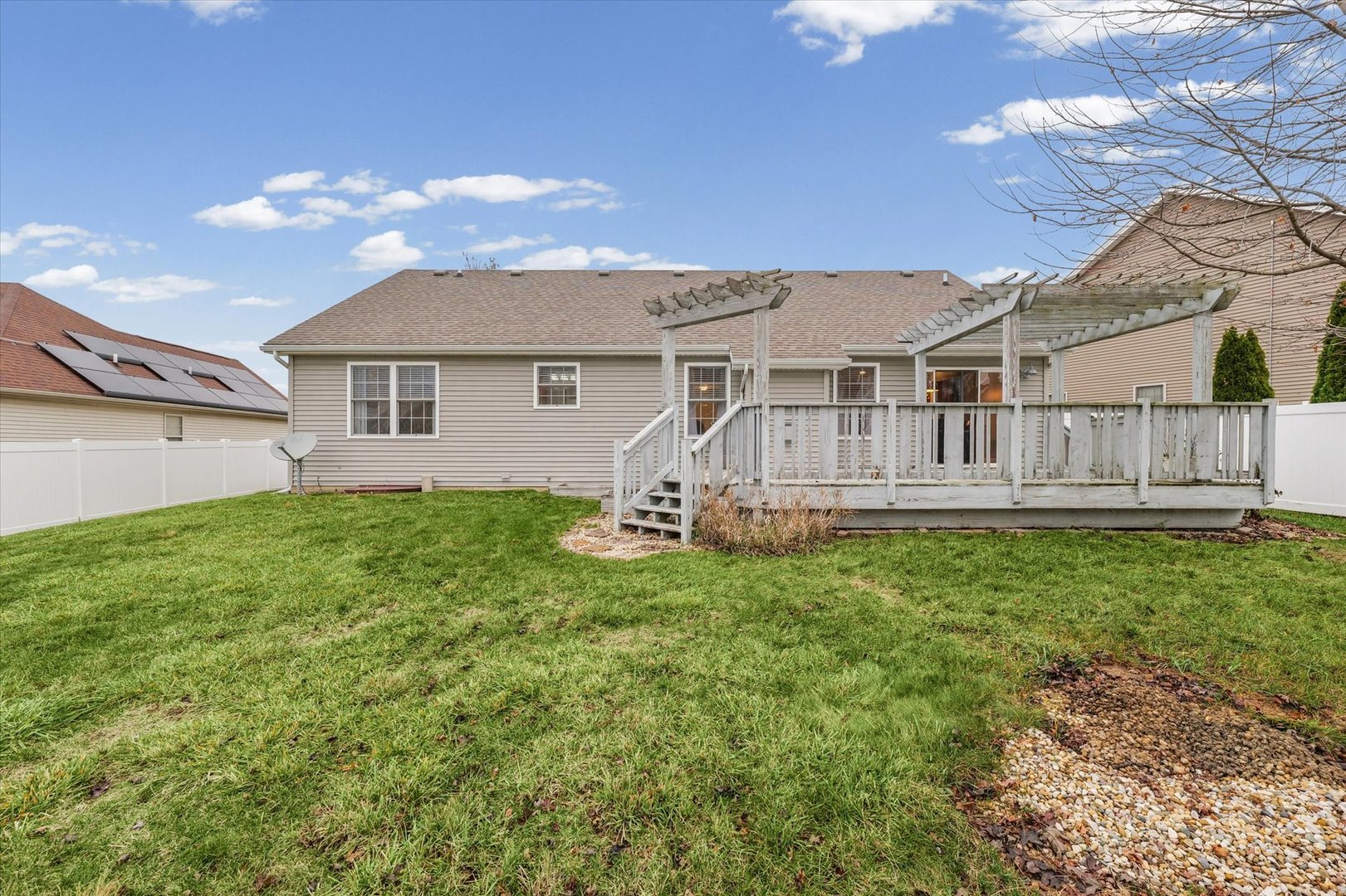 1713 Hunters Ridge Court Mahomet, IL 61853 - Photo 27 of 30 a view of a house with a yard