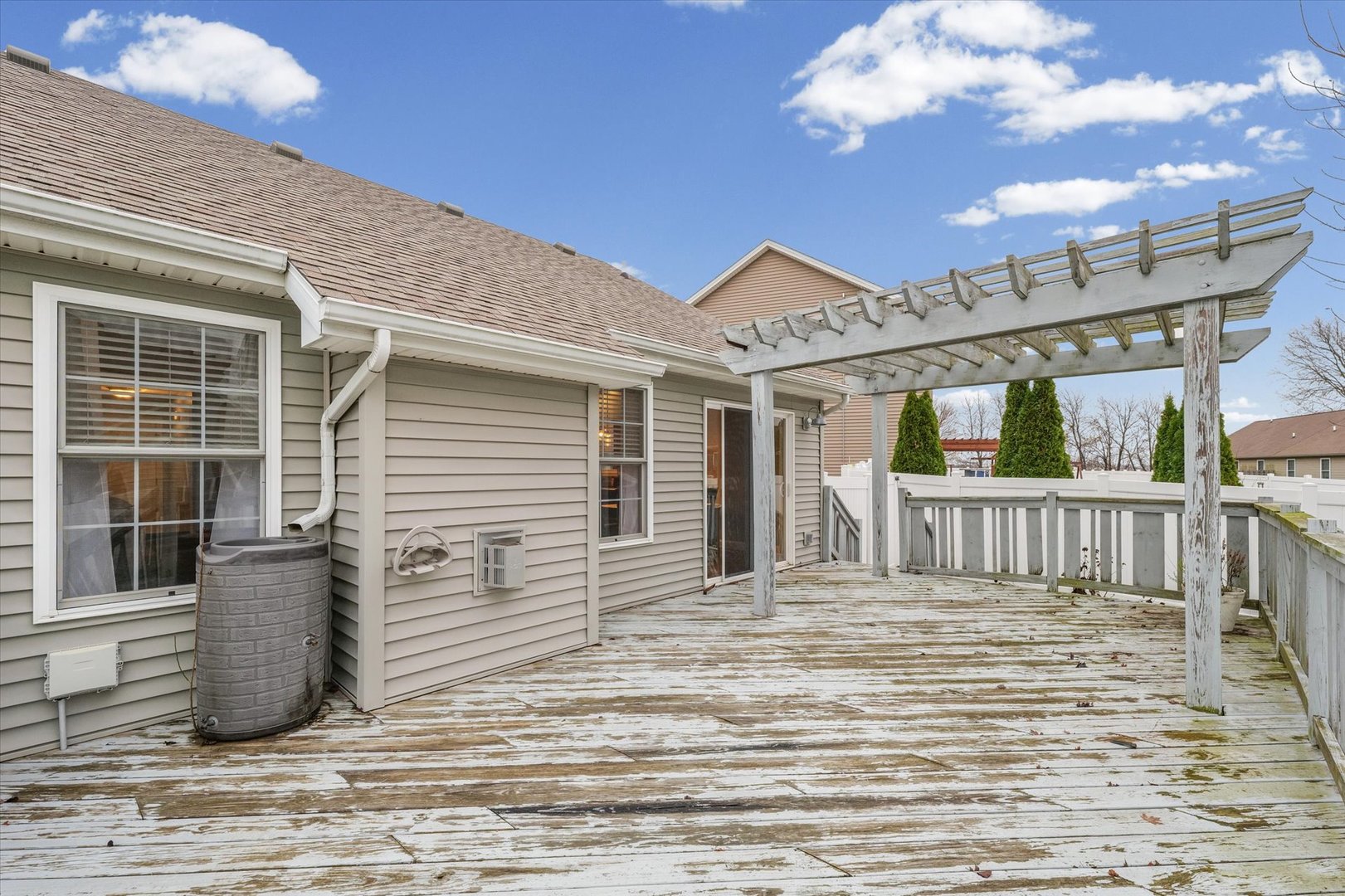 1713 Hunters Ridge Court Mahomet, IL 61853 - Photo 28 of 30 a view of a house with a balcony