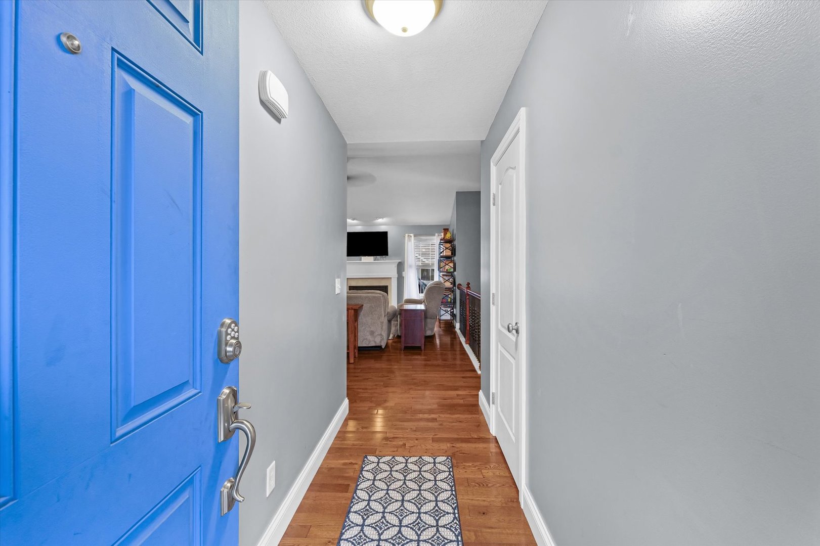 1713 Hunters Ridge Court Mahomet, IL 61853 - Photo 4 of 30 a view of a hallway with a livingroom and a hallway