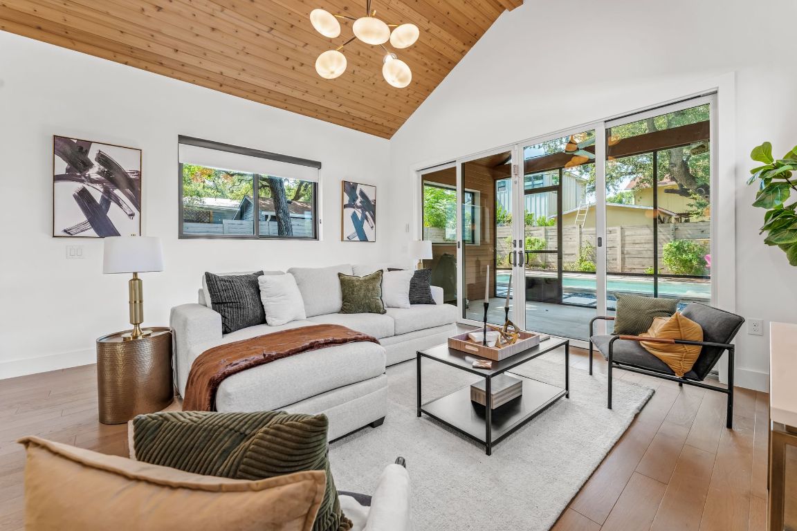 205 Ben Howell Drive Austin, TX 78704 - Photo 11 of 38 a bedroom with furniture and a large window