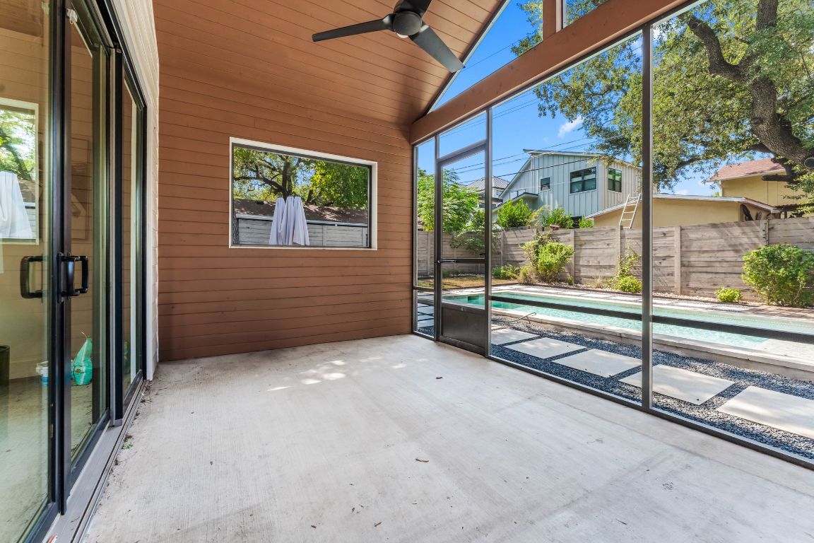 205 Ben Howell Drive Austin, TX 78704 - Photo 31 of 38 a view of a room with porch and wooden floor