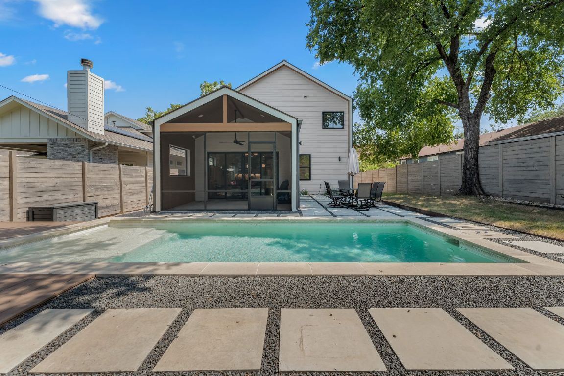 205 Ben Howell Drive Austin, TX 78704 - Photo 34 of 38 a front view of a house with garden