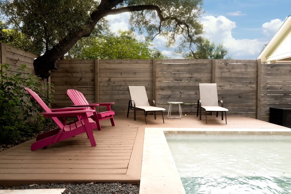 205 Ben Howell Drive Austin, TX 78704 - Photo 35 of 38 a view of a chairs and fire pit in the patio