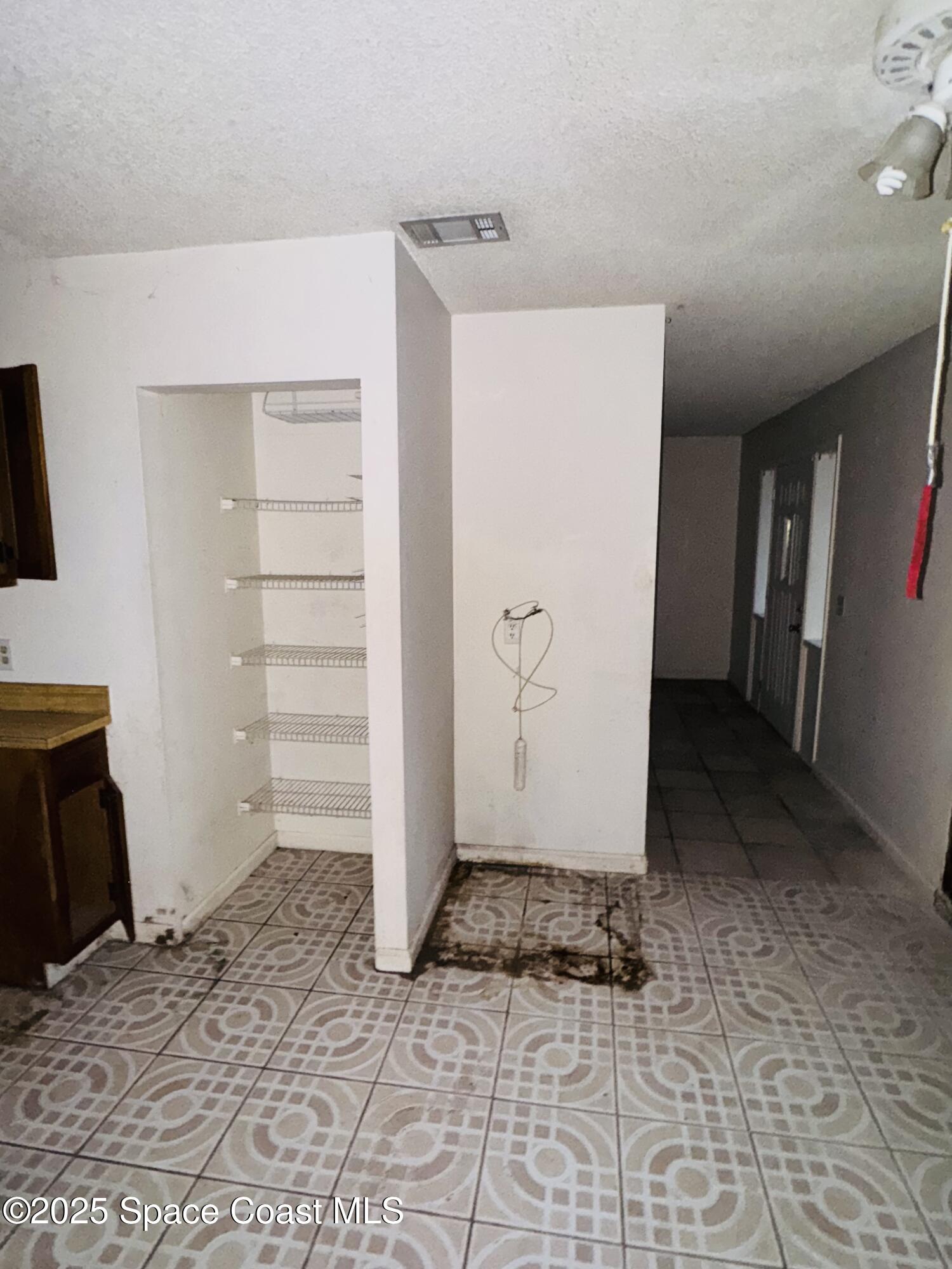 255 Abalone Road Northwest Palm Bay, FL 32907 - Photo 3 of 11 a view of a storage & utility room