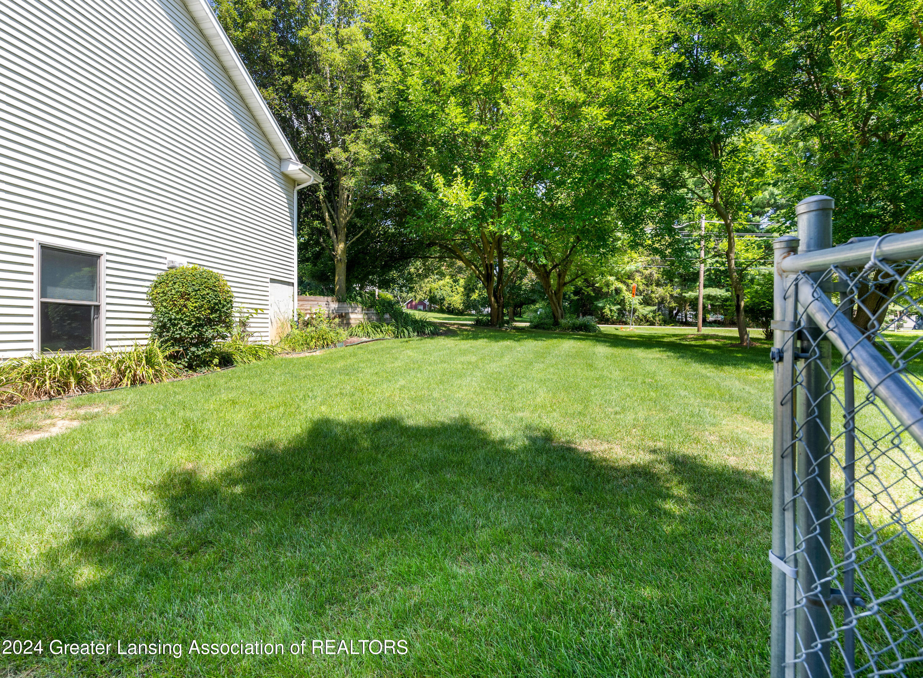 6450 Coleman Road East Lansing, MI 48823 - Photo 8 of 34 Side Yard