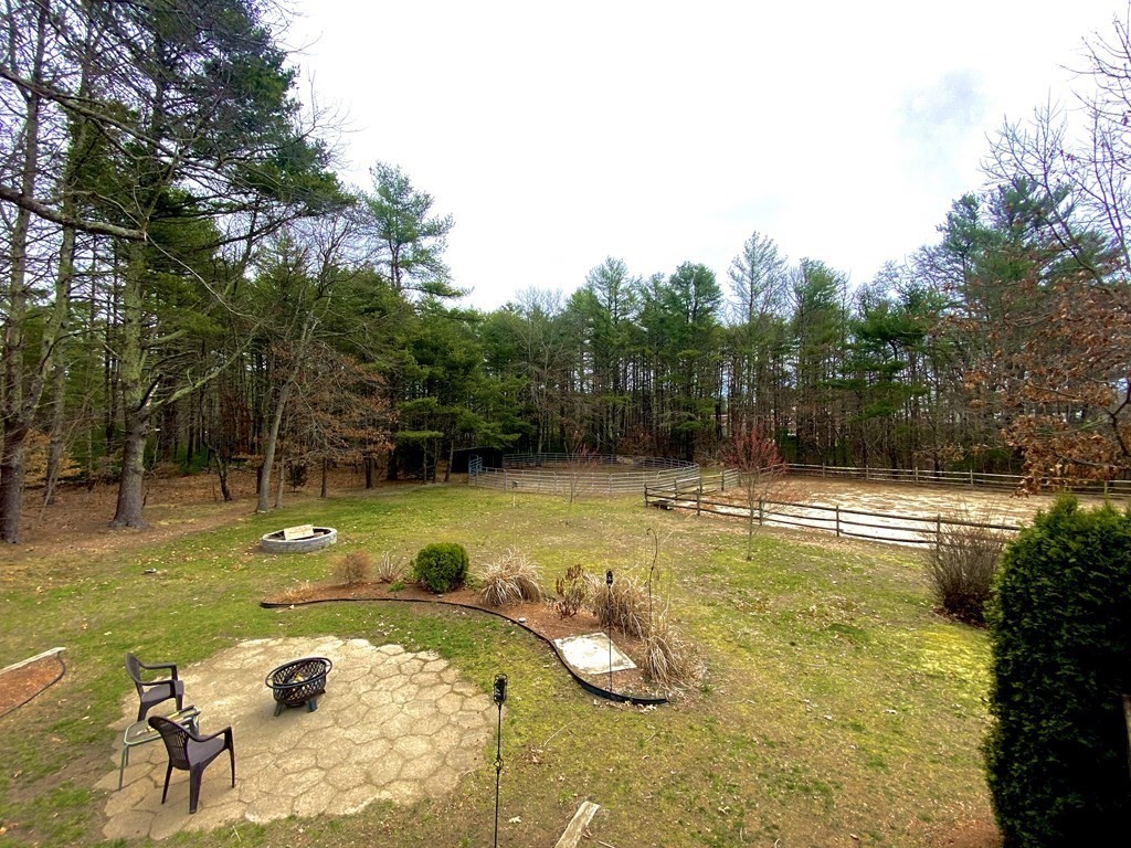 48 Pine Street Rochester, MA 02770 - Photo 16 of 39 a view of a swimming pool with a patio