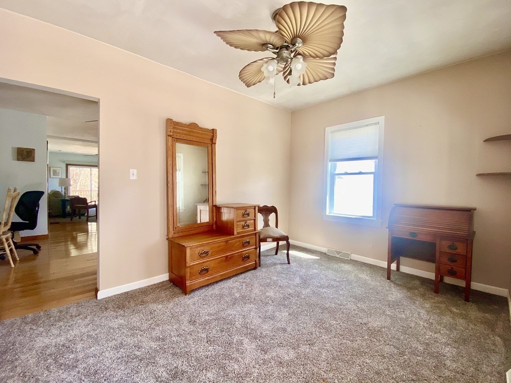 48 Pine Street Rochester, MA 02770 - Photo 18 of 39 a living room with furniture and a table