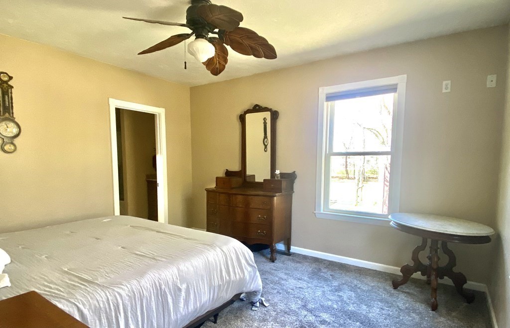 48 Pine Street Rochester, MA 02770 - Photo 24 of 39 a bedroom with a bed and a window