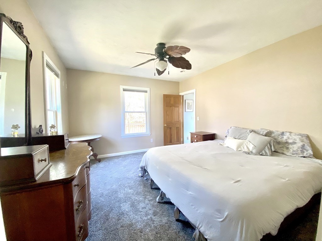 48 Pine Street Rochester, MA 02770 - Photo 25 of 39 a bedroom with a bed and window