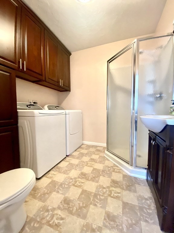 48 Pine Street Rochester, MA 02770 - Photo 29 of 39 a bathroom with a sink a toilet and shower