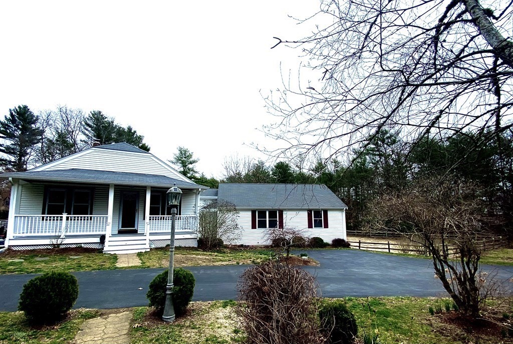 48 Pine Street Rochester, MA 02770 - Photo 3 of 39 a front view of a house with garden