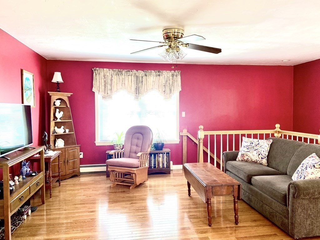 48 Pine Street Rochester, MA 02770 - Photo 35 of 39 a living room with furniture and wooden floor