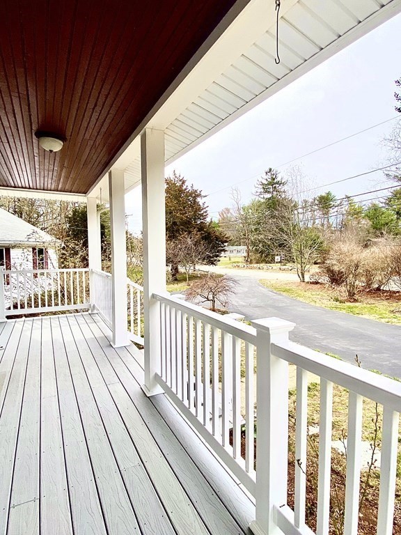 48 Pine Street Rochester, MA 02770 - Photo 4 of 39 a view of a balcony with wooden floor