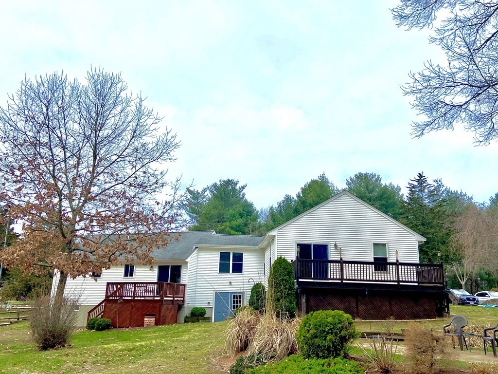 48 Pine Street Rochester, MA 02770 - Photo 5 of 39 a front view of a house with a yard