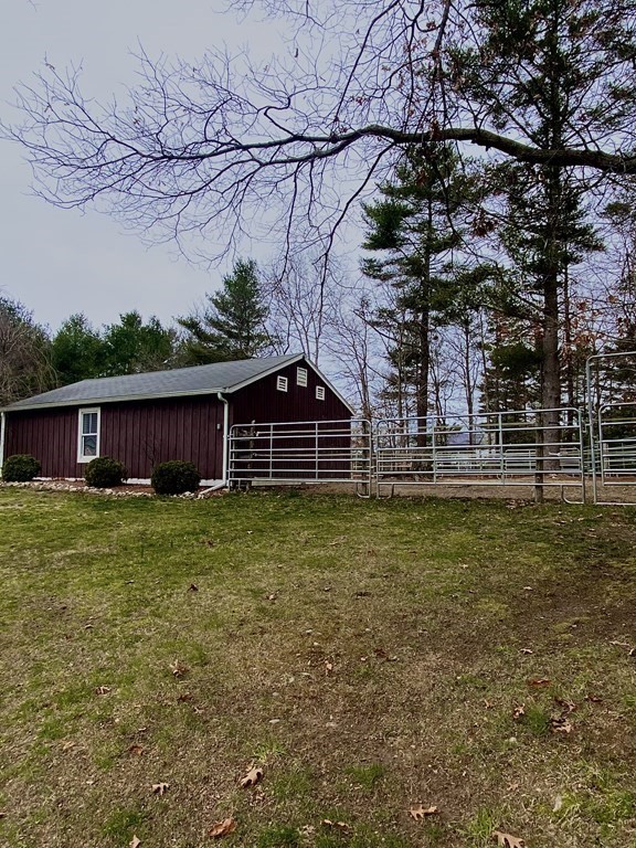 48 Pine Street Rochester, MA 02770 - Photo 9 of 39 a view of a house with a backyard