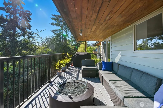 a view of balcony with furniture