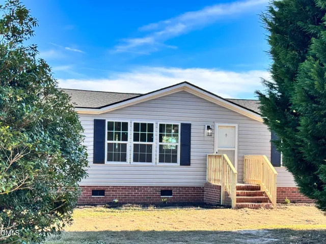 a view of a house with a patio