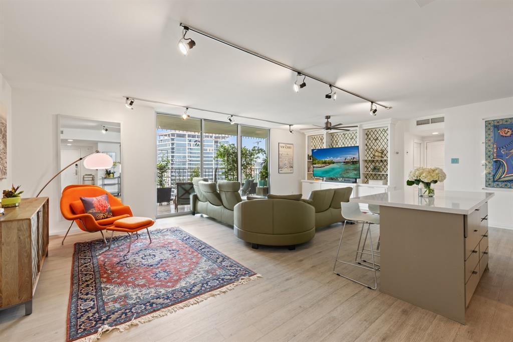 Living Room with Balcony & City Views