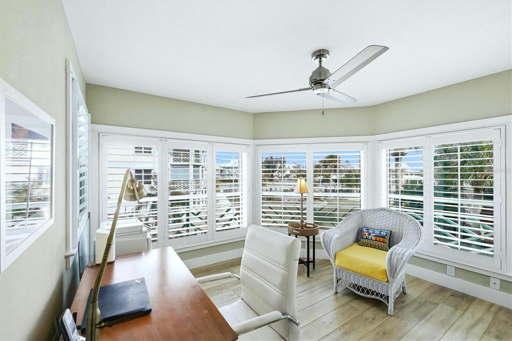11000 Placida Road, Unit 2501 Placida, FL 33946 - Photo 24 of 56 a living room with furniture and a large window