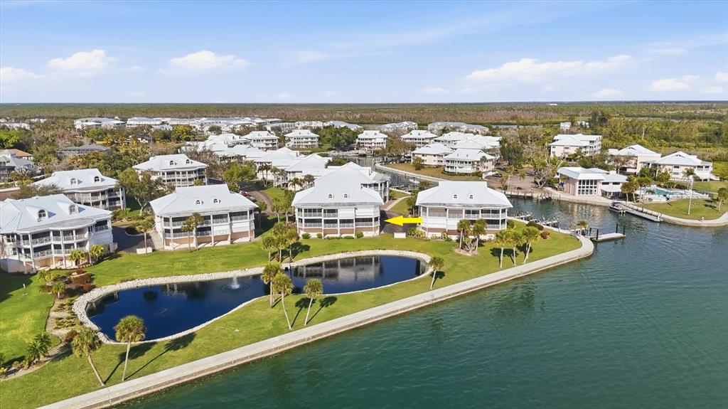 11000 Placida Road, Unit 2501 Placida, FL 33946 - Photo 29 of 56 an aerial view of residential houses with outdoor space