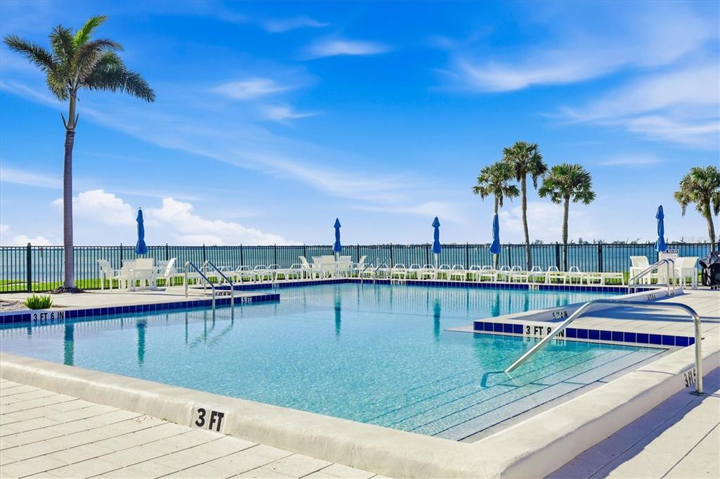 11000 Placida Road, Unit 2501 Placida, FL 33946 - Photo 35 of 56 a view of a lake with a terrace