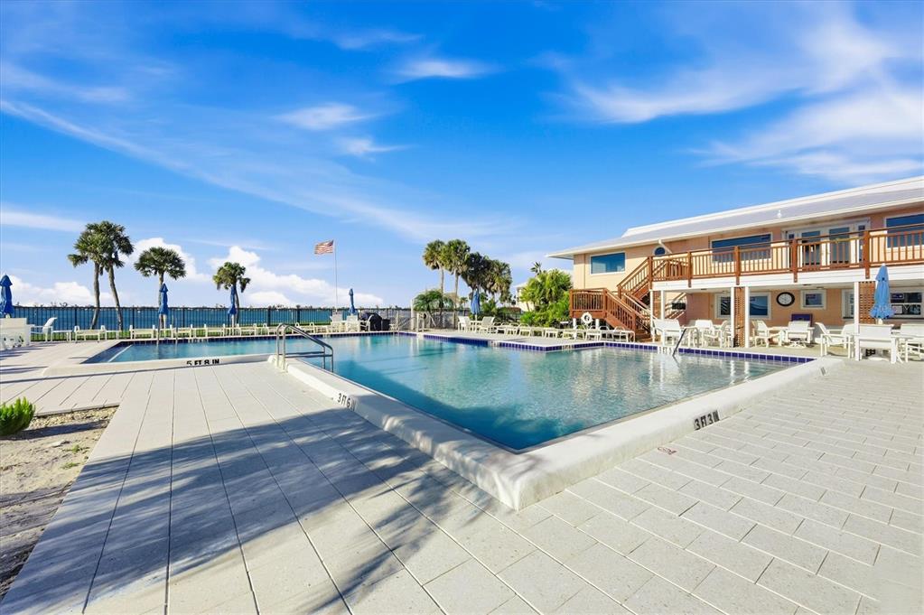 11000 Placida Road, Unit 2501 Placida, FL 33946 - Photo 36 of 56 a view of swimming pool with outdoor seating