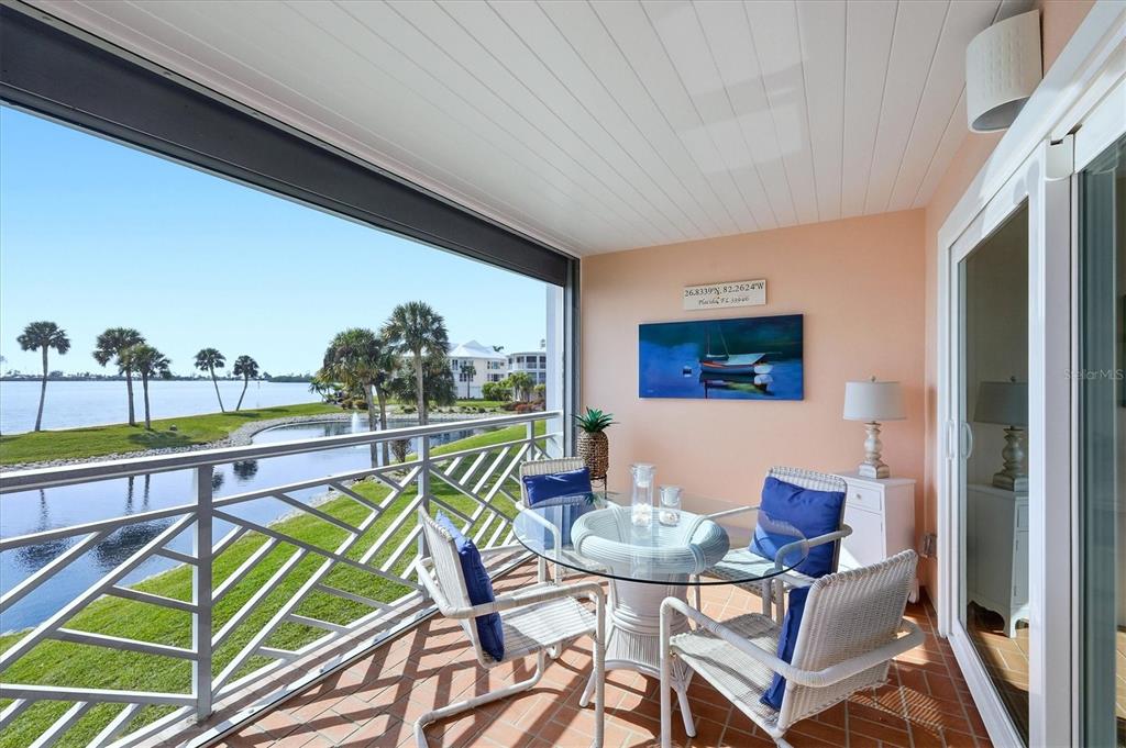 11000 Placida Road, Unit 2501 Placida, FL 33946 - Photo 4 of 56 a outdoor space with furniture
