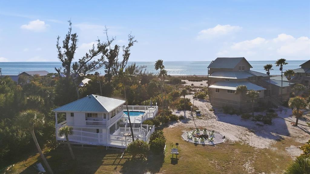 11000 Placida Road, Unit 2501 Placida, FL 33946 - Photo 46 of 56 a view of a terrace with sitting area