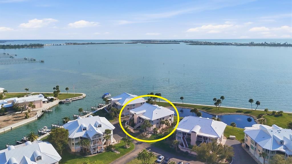 11000 Placida Road, Unit 2501 Placida, FL 33946 - Photo 51 of 56 a view of a swimming pool and lounge chair
