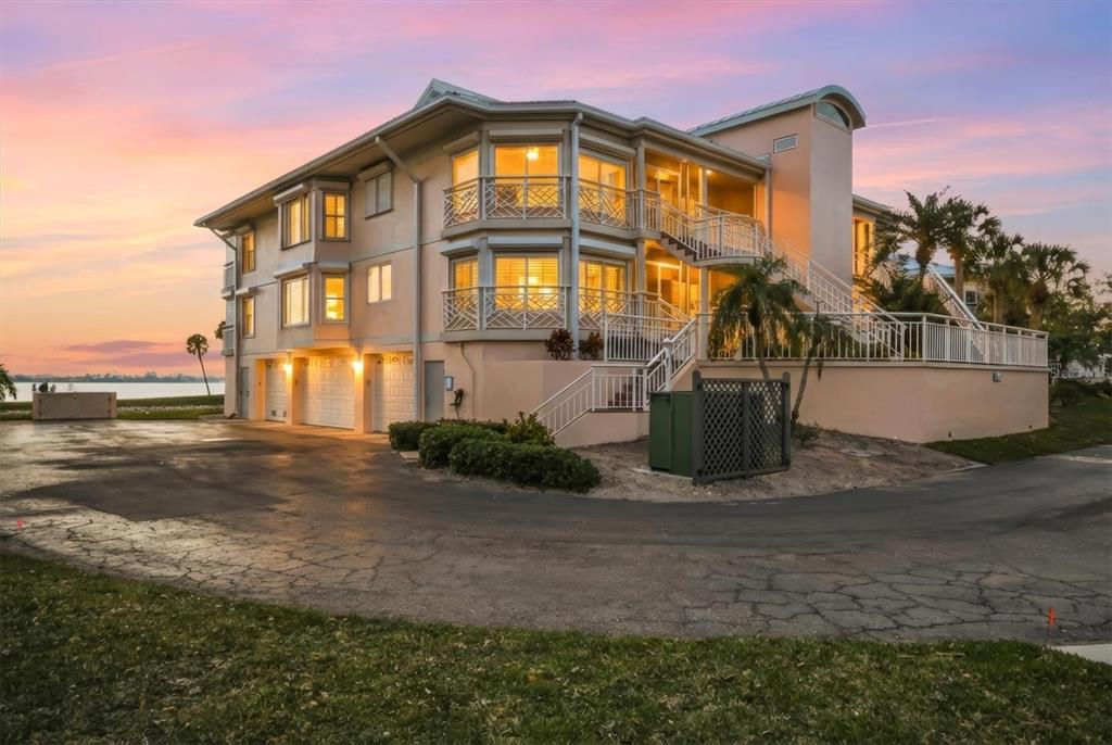 11000 Placida Road, Unit 2501 Placida, FL 33946 - Photo 56 of 56 a front view of a house with a yard
